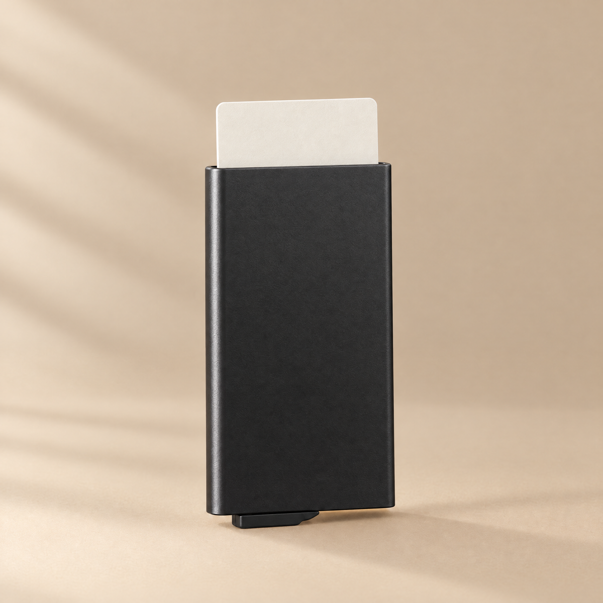 KEEL CARRY Core pop-up card wallet with one card partly raised.
