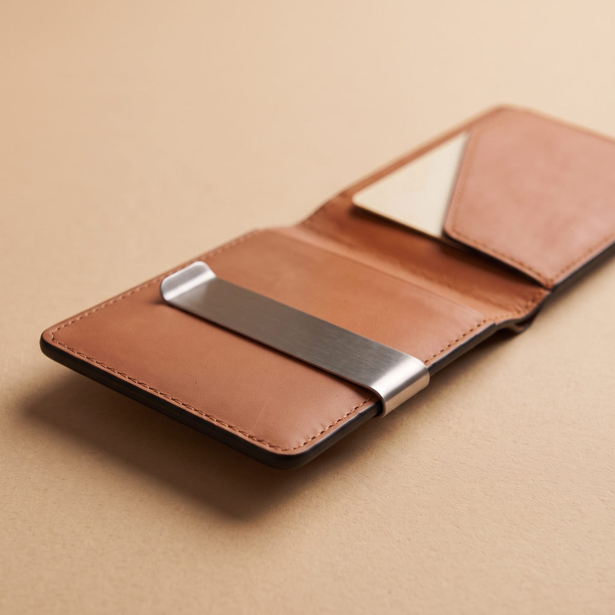 Slim Faux Leather Bifold with Money Clip opened, showing the clip and the angled card pocket