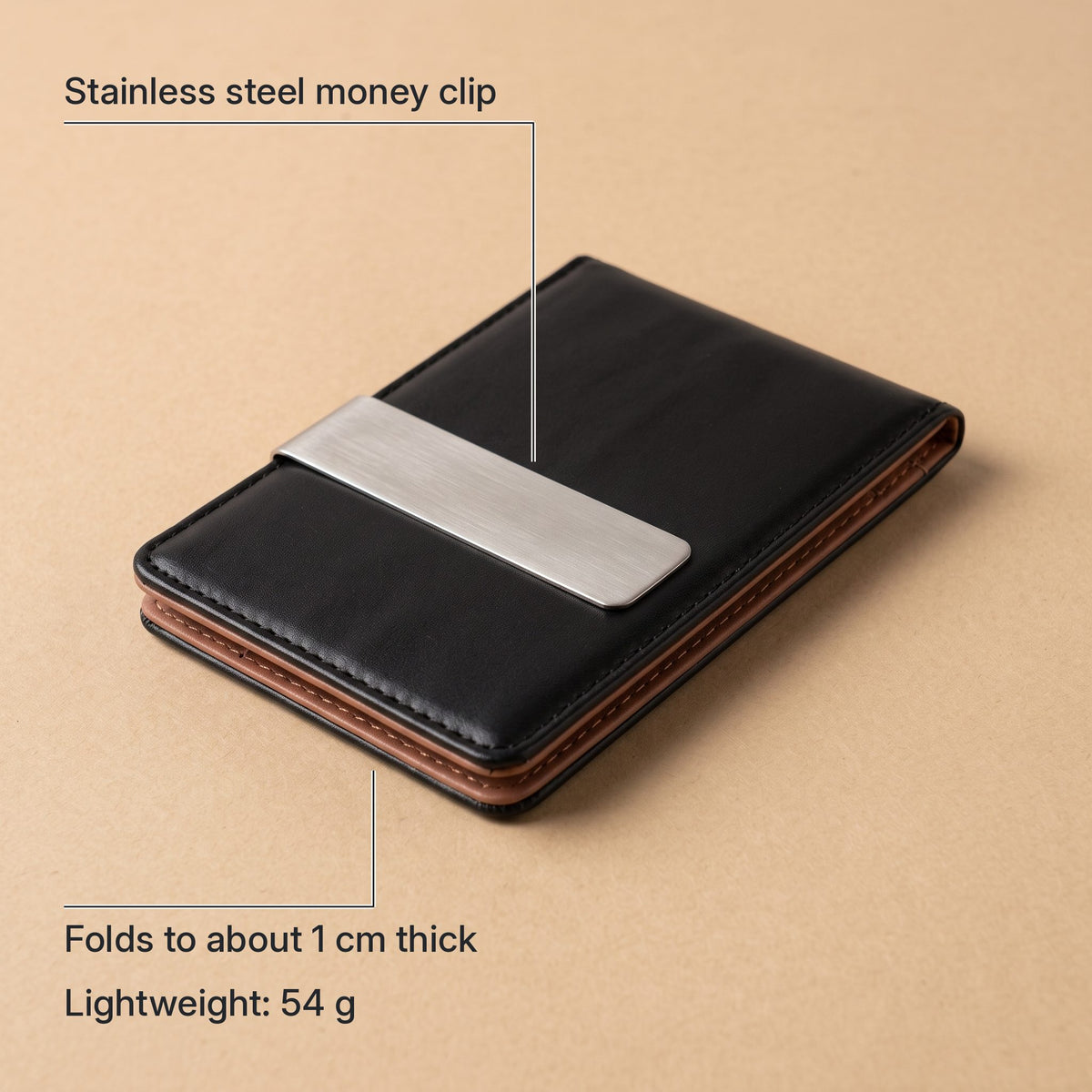 Slim bifold wallet with stainless steel money clip, folds to about 1 cm thick, lightweight at 54 g.